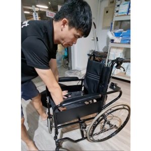 Opening up a manual wheelchair