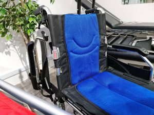 Wheelchair with flip up armrest
